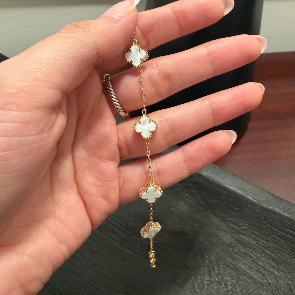 Elegant Gold and White Clover Bracelet